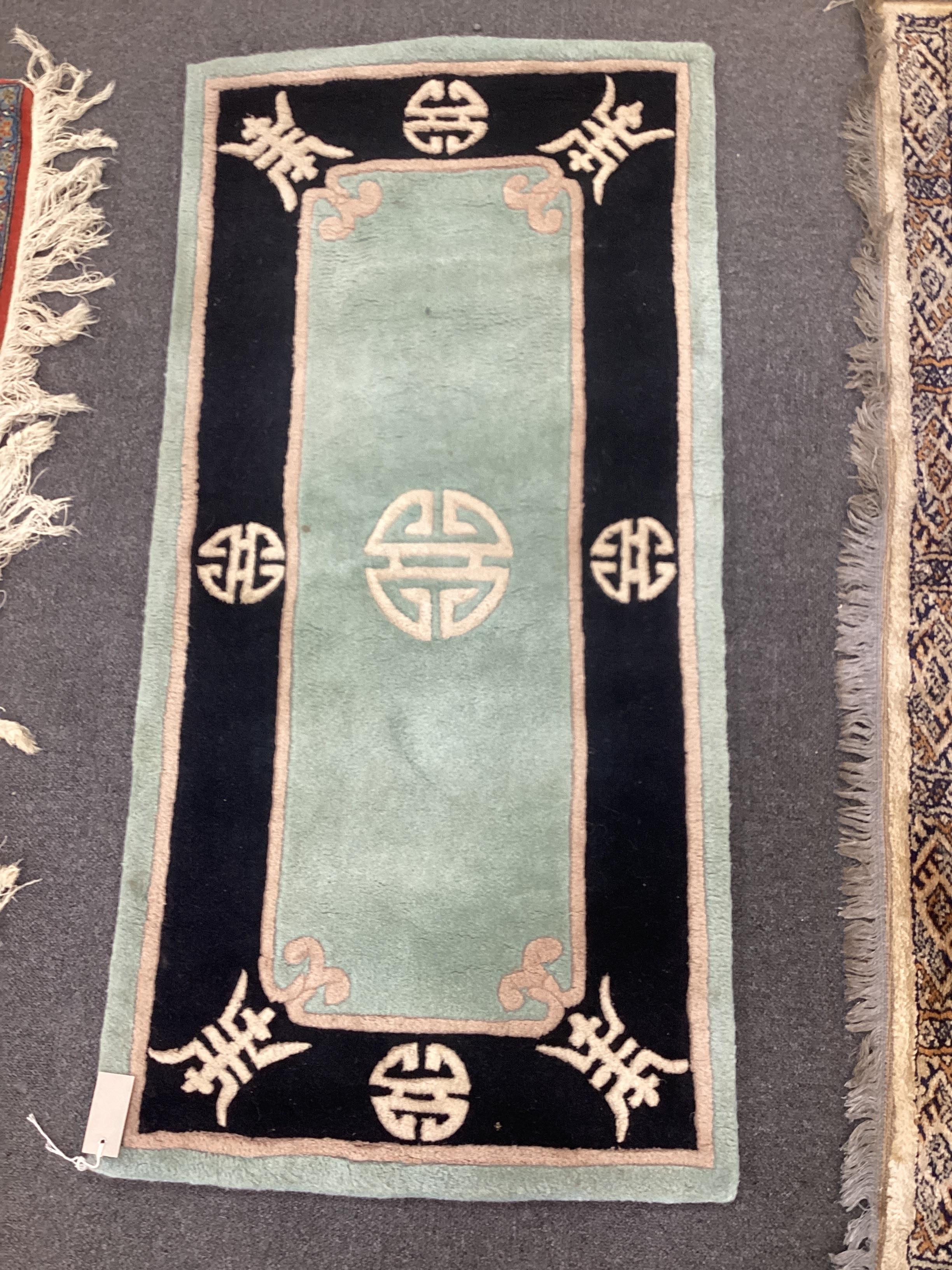 A Bokhara rug and a small Chinese rug, larger 180 x 132cm
